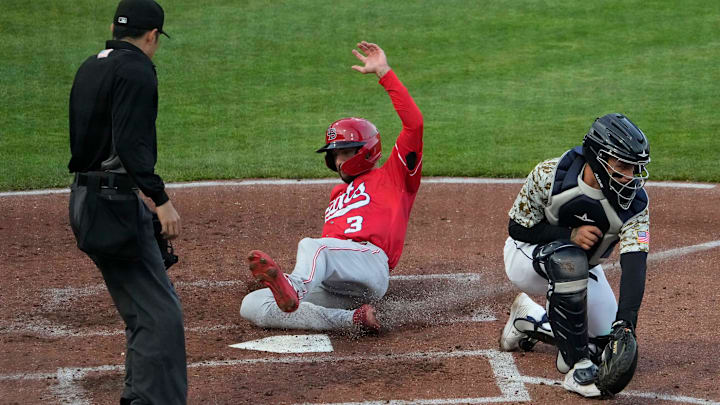 Louisville Bats center fielder Albert Almora Jr. (3) scores a run behind Columbus Clippers infielder Tyler Freeman (10) during the Minor League Baseball game at Huntington Park in Columbus on April 27, 2022.

Minor Leage Baseball Louisville Bats At Columbus Clippers