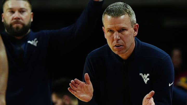 West Virginia Mountaineers men's basketball head coach Ross Hodge reacts during the first half against Iowa State on Jan. 2, 2026, at Hilton Coliseum in Ames, Iowa.