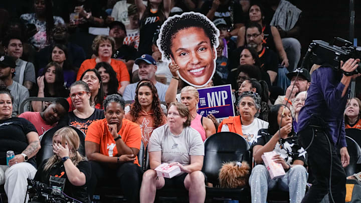Mercury fans hold up an oversized photo of Alyssa Thomas as Phoenix faces the Chicago Sky for a home game at PHX Arena on Aug. 28, 2025, in Phoenix.