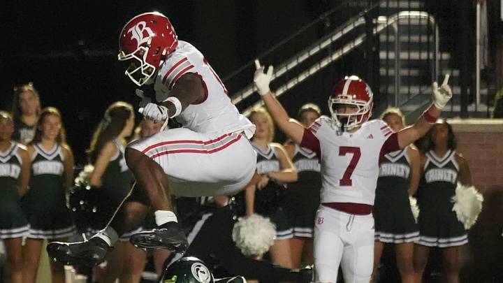 Chattanooga Baylor’s David Gabriel-Georges hurdles a Trinity defender to score on the opening drive of the second half. Sep 11, 2026 Chattanooga Baylor’s David Gabriel-Georges hurdles a Trinity defender to score on the opening drive of the second half. Sep 11, 2026