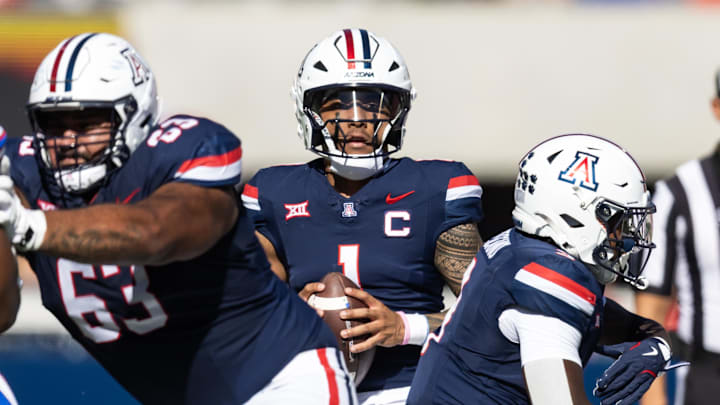 Nov 8, 2025; Tucson, Arizona, USA; Arizona Wildcats quarterback Noah Fifita (1) against the Kansas Jayhawks in the first half at Arizona Stadium. Mandatory Credit: Mark J. Rebilas-Imagn Images