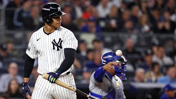 Oct 7, 2024; Bronx, New York, USA; New York Yankees outfielder Juan Soto (22) reacts after striking out against the Kansas City Royals in the third inning during game two of the ALDS for the 2024 MLB Playoffs at Yankee Stadium. Mandatory Credit: Vincent Carchietta-Imagn Images