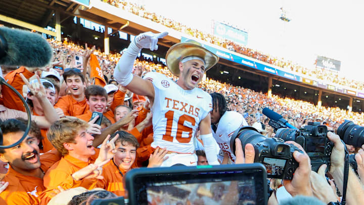 Oct 12, 2024; Dallas, Texas, USA; Texas Longhorns defensive back Michael Taaffe (16) celebrates with fans after the game against the Oklahoma Sooners at the Cotton Bowl. Mandatory Credit: Kevin Jairaj-Imagn Images Oct 12, 2024; Dallas, Texas, USA; Texas Longhorns defensive back Michael Taaffe (16) celebrates with fans after the game against the Oklahoma Sooners at the Cotton Bowl. Mandatory Credit: Kevin Jairaj-Imagn Images
