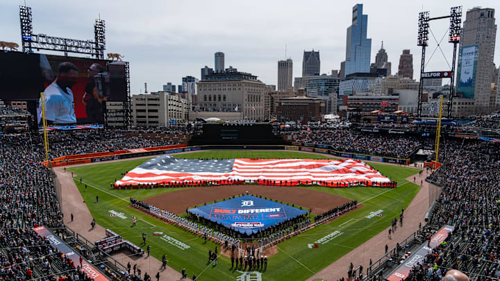 Hundreds of fans stand for the Pledge of Allegiance before the start of the Detroit Tigers’ Opening Day game against the Chicago White Sox at Comerica Park in Detroit on Friday, April 4, 2023.