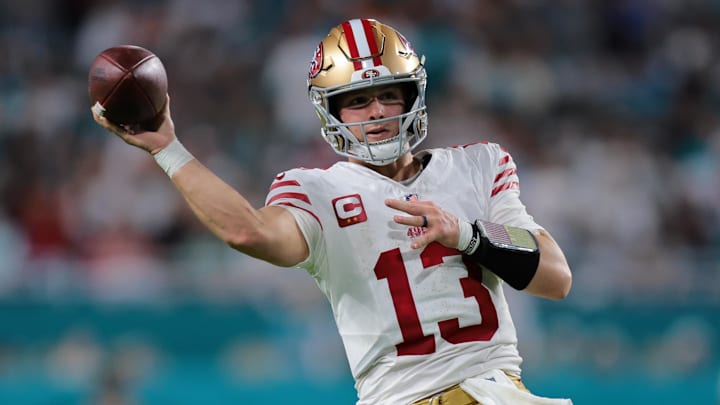 Dec 22, 2024; Miami Gardens, Florida, USA; San Francisco 49ers quarterback Brock Purdy (13) throws the football against the Miami Dolphins during the fourth quarter at Hard Rock Stadium. Mandatory Credit: Sam Navarro-Imagn Images Dec 22, 2024; Miami Gardens, Florida, USA; San Francisco 49ers quarterback Brock Purdy (13) throws the football against the Miami Dolphins during the fourth quarter at Hard Rock Stadium. Mandatory Credit: Sam Navarro-Imagn Images