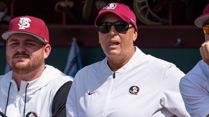 Florida State Seminoles head coach Lonni Alameda watches from the dugout. The Texas Tech Red Raiders defeated the Florida State Seminoles 2-1 in the NCAA WCWS Super Regionals on Friday, May 23, 2025.