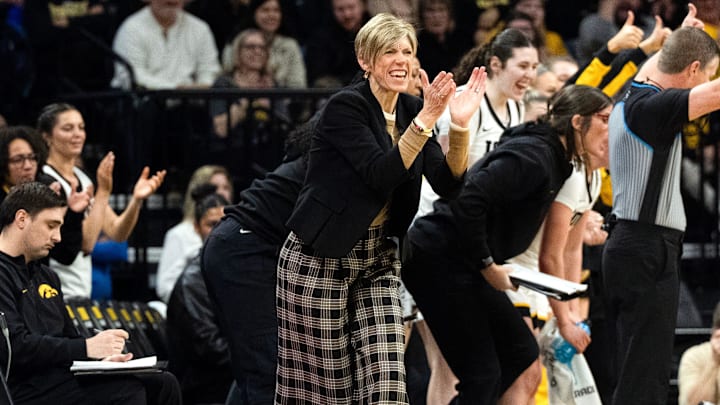 Iowa head coach Jan Jensen reacts duirng a basketball game against the Michigan Wolverines Feb. 22, 2026 at Carver-Hawkeye Arena in Iowa City, Iowa.