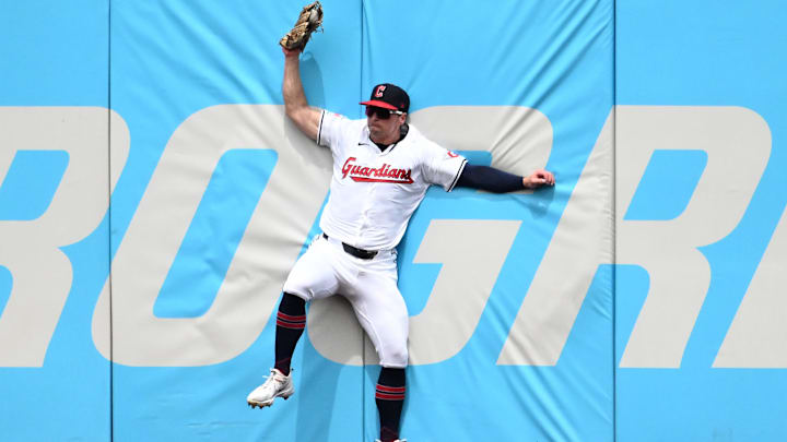 Jul 21, 2024: Cleveland Guardians right fielder Will Brennan (17) catches a ball hit by San Diego Padres third baseman Manny Machado (not pictured) during the sixth inning at Progressive Field. 