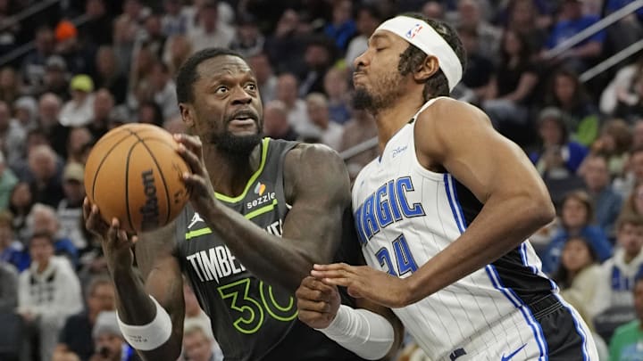 Minnesota Timberwolves forward Julius Randle (30) shoots against Orlando Magic center Wendell Carter Jr. (34) in the first quarter at Target Center.
