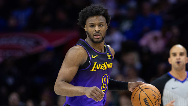Jan 28, 2025; Philadelphia, Pennsylvania, USA; Los Angeles Lakers guard Bronny James (9) controls the ball against the Philadelphia 76ers at Wells Fargo Center. Mandatory Credit: Bill Streicher-Imagn Images Jan 28, 2025; Philadelphia, Pennsylvania, USA; Los Angeles Lakers guard Bronny James (9) controls the ball against the Philadelphia 76ers at Wells Fargo Center. Mandatory Credit: Bill Streicher-Imagn Images
