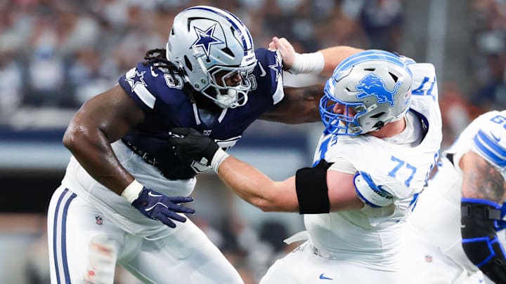Dallas Cowboys defensive tackle Mazi Smith and Detroit Lions center Frank Ragnow battle during the second quarter.