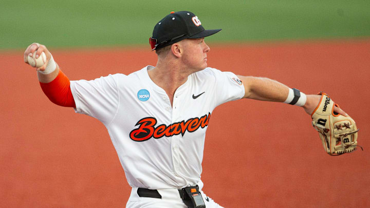 Oregon State's Trent Caraway throws to first base against Tulane in the Corvallis Regional of the NCAA Tournament Friday, May 31, 2024, at Goss Stadium in Corvallis, Ore.