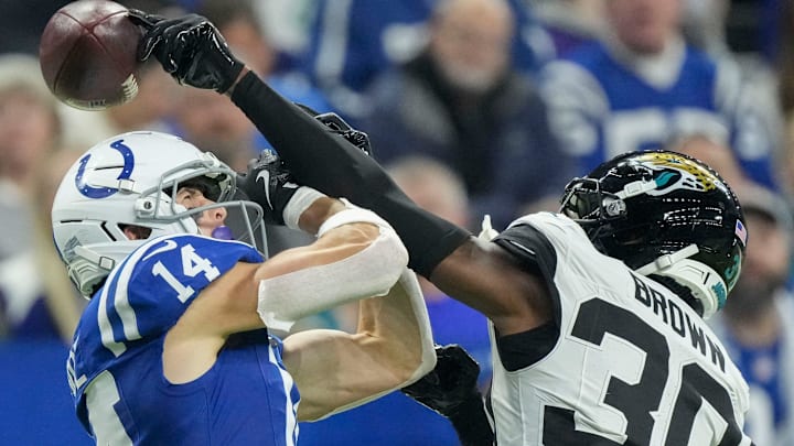 Jacksonville Jaguars cornerback Montaric Brown (30) breaks up a pass intended for Indianapolis Colts wide receiver Alec Pierce (14) on Sunday, Dec. 28, 2025, during a game at Lucas Oil Stadium in Indianapolis. Jacksonville Jaguars cornerback Montaric Brown (30) breaks up a pass intended for Indianapolis Colts wide receiver Alec Pierce (14) on Sunday, Dec. 28, 2025, during a game at Lucas Oil Stadium in Indianapolis.