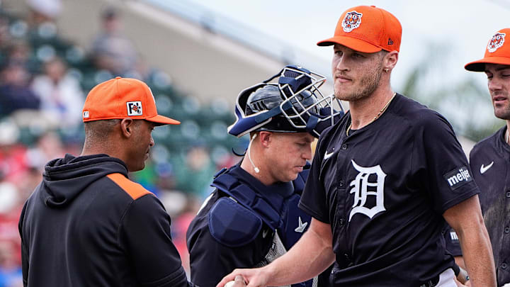 Detroit Tigers pitcher Matt Manning hands the ball to bench coach George Lombard during the fourth inning of a Grapefruit League game at Joker Marchant Stadium in Lakeland, Fla. on Saturday, Feb. 22, 2025. Detroit Tigers pitcher Matt Manning hands the ball to bench coach George Lombard during the fourth inning of a Grapefruit League game at Joker Marchant Stadium in Lakeland, Fla. on Saturday, Feb. 22, 2025.