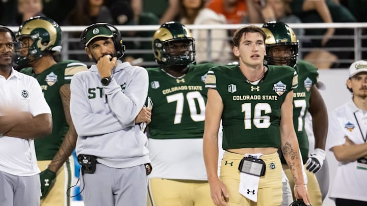 Dec 28, 2024; Tucson, AZ, USA; Colorado State Rams head coach Jay Norvell and quarterback Brayden Fowler-Nicolosi (16) against the Miami (OH) RedHawks during the Snoop Dogg Arizona Bowl at Arizona Stadium. Mandatory Credit: Mark J. Rebilas-Imagn Images

