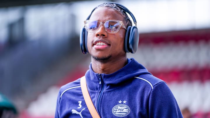 May 18, 2025: 2024-2025 season, Football , Eredivisie. Match between Sparta and PSV. PSV player Tyrell Malacia walks into the stadium with a blue hoodie on and headphones.