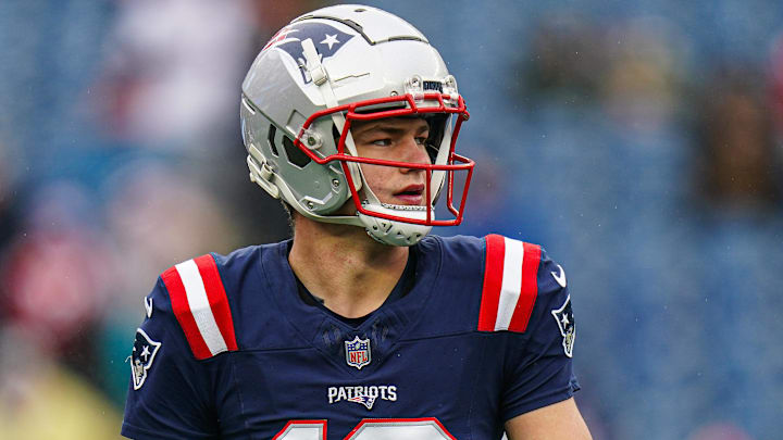 Dec 28, 2024; Foxborough, Massachusetts, USA; New England Patriots quarterback Drake Maye (10) warms up before the start of the game against the Los Angeles Chargers at Gillette Stadium. Mandatory Credit: David Butler II-Imagn Images