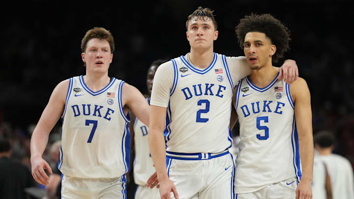 Apr 5, 2025; San Antonio, TX, USA;  Duke Blue Devils forward Cooper Flagg (2) and Duke Blue Devils guard Tyrese Proctor (5) react against the Houston Cougars in the semifinals of the men's Final Four of the 2025 NCAA Tournament at the Alamodome. Mandatory Credit: Robert Deutsch-Imagn Images