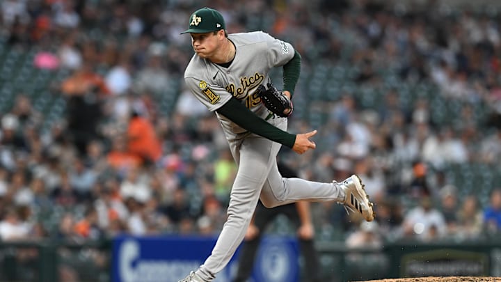 Jun 25, 2025; Detroit, Michigan, USA; Athletics   pitcher Mason Miller (19) throws a pitch against the Detroit Tigers in the ninth inning at Comerica Park. Mandatory Credit: Lon Horwedel-Imagn Images