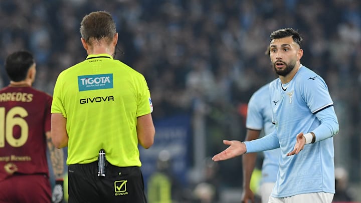 Referee Marco Guida (L) Valentin Castellanos of SS Lazio (R...