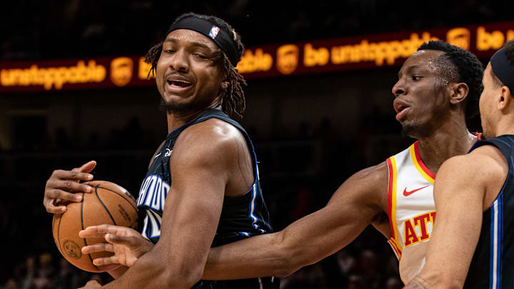 Orlando Magic center Wendell Carter Jr. (34) takes rebound from Atlanta Hawks forward Onyeka Okongwu (17) during fourth quarter at State Farm Arena.