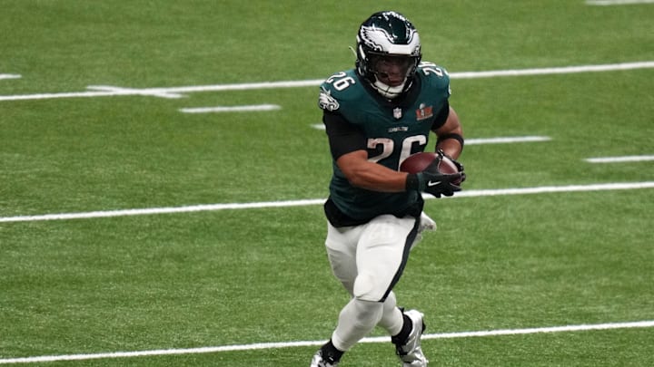 Feb 9, 2025; New Orleans, LA, USA; Philadelphia Eagles running back Saquon Barkley (26) rushes the ball against the Kansas City Chiefs during the fourth quarter in Super Bowl LIX at Caesars Superdome. 