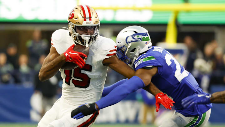Oct 10, 2024; Seattle, Washington, USA; San Francisco 49ers wide receiver Jauan Jennings (15) runs for yards after the catch against Seattle Seahawks cornerback Tre Brown (22) during the second quarter at Lumen Field. Mandatory Credit: Joe Nicholson-Imagn Images Oct 10, 2024; Seattle, Washington, USA; San Francisco 49ers wide receiver Jauan Jennings (15) runs for yards after the catch against Seattle Seahawks cornerback Tre Brown (22) during the second quarter at Lumen Field. Mandatory Credit: Joe Nicholson-Imagn Images