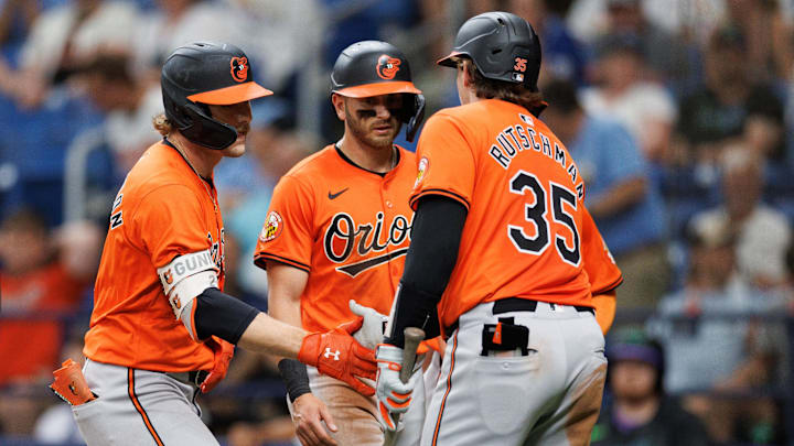 Jun 8, 2024; St. Petersburg, Florida, USA;  Baltimore Orioles shortstop Gunnar Henderson (2) celebrates with catcher Adley Rutschman (35) after hitting a three-run home run against the Tampa Bay Rays in the ninth inning  at Tropicana Field.