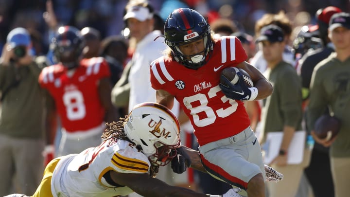 Nov 18, 2023; Oxford, Mississippi, USA; Mississippi Rebels wide receiver Cayden Lee (83) runs after a catch for a touchdown against Louisiana Monroe Warhawks linebacker Max Harris (24) during the second half at Vaught-Hemingway Stadium. Mandatory Credit: Petre Thomas-USA TODAY Sports Nov 18, 2023; Oxford, Mississippi, USA; Mississippi Rebels wide receiver Cayden Lee (83) runs after a catch for a touchdown against Louisiana Monroe Warhawks linebacker Max Harris (24) during the second half at Vaught-Hemingway Stadium. Mandatory Credit: Petre Thomas-USA TODAY Sports