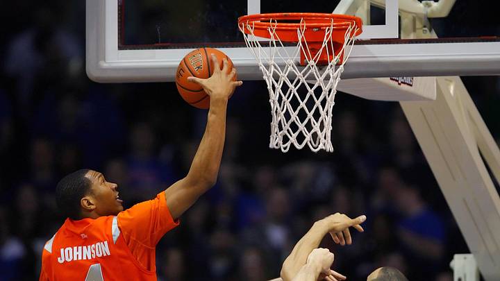 Jan 30, 20010; Rosemont, IL, USA; Syracuse Orange forward Wesley Johnson (4) pulls down a rebound during the first half of a game against the DePaul Blue Demons at Allstate Arena. Mandatory Credit: Dennis Wierzbicki-Imagn Images Jan 30, 20010; Rosemont, IL, USA; Syracuse Orange forward Wesley Johnson (4) pulls down a rebound during the first half of a game against the DePaul Blue Demons at Allstate Arena. Mandatory Credit: Dennis Wierzbicki-Imagn Images