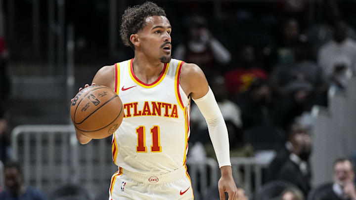 Oct 10, 2023; Atlanta, Georgia, USA; Atlanta Hawks guard Trae Young (11) brings the ball up the