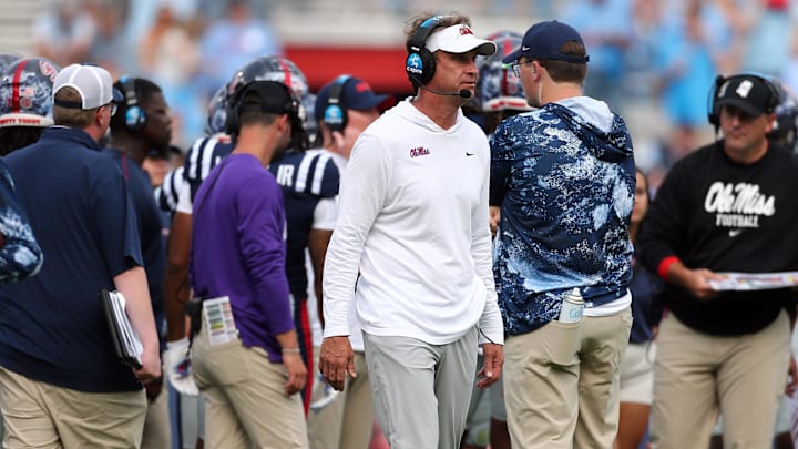 Oct 26, 2024; Oxford, Mississippi, USA; Mississippi Rebels head coach Lane Kiffin watches during a time out during the second half against the Oklahoma Sooners at Vaught-Hemingway Stadium. Mandatory Credit: Petre Thomas-Imagn Images Oct 26, 2024; Oxford, Mississippi, USA; Mississippi Rebels head coach Lane Kiffin watches during a time out during the second half against the Oklahoma Sooners at Vaught-Hemingway Stadium. Mandatory Credit: Petre Thomas-Imagn Images
