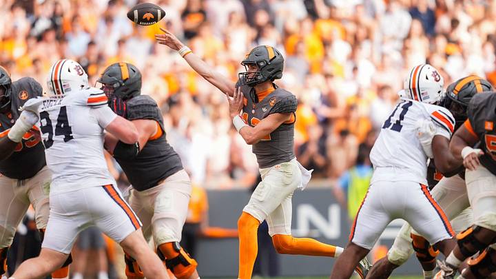 Tennessee quarterback George MacIntyre (12) throws the ball during a college football game between Tennessee and Auburn at Neyland Stadium in Knoxville, Tenn., on Oct. 3, 2026.