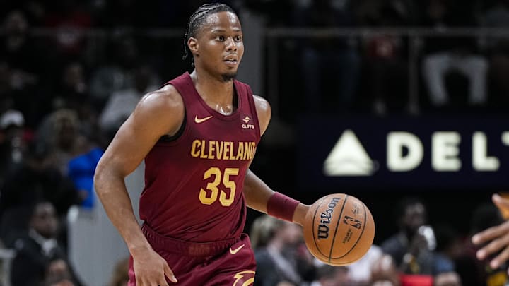 Oct 10, 2023; Atlanta, Georgia, USA; Cleveland Cavaliers forward Isaac Okoro (35) brings the ball up the court against the Atlanta Hawks during the second half at State Farm Arena. Mandatory Credit: Dale Zanine-Imagn Images