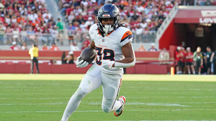 Aug 9, 2025; Santa Clara, California, USA;  Denver Broncos running back Jaleel McLaughlin (38) rushes the ball in the second quarter against the San Francisco 49ers at Levi's Stadium. Mandatory Credit: David Gonzales-Imagn Images