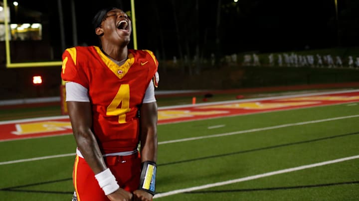 Clarke Central's Hezekiah Millender (4) celebrates after winning a GHSA high school football game against Oconee County in Athens, Ga., on Friday, Aug. 23, 2024. Clarke Central won 37-36.