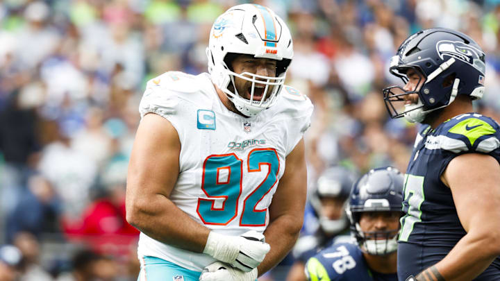 Miami Dolphins defensive tackle Zach Sieler (92) celebrates following a sack against the Seattle Seahawks during the second quarter at Lumen Field. Miami Dolphins defensive tackle Zach Sieler (92) celebrates following a sack against the Seattle Seahawks during the second quarter at Lumen Field.