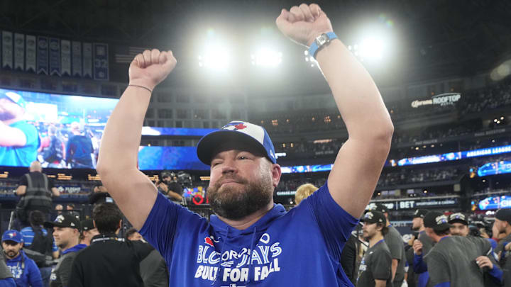 Oct 20, 2025; Toronto, Ontario, CAN; Toronto Blue Jays manager John Schneider celebrates after defeating the Seattle Mariners during game seven of the ALCS round for the 2025 MLB playoffs at Rogers Centre. Mandatory Credit: John E. Sokolowski-Imagn Images
