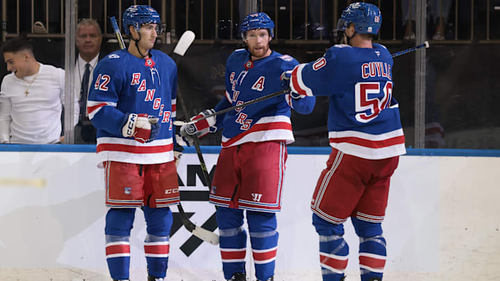 Sep 23, 2025; New York, New York, USA; New York Rangers defenseman Vladislav Gavrikov  (44) celebrates his goal with teammates during the second period of a preseason game against the Boston Bruins at Madison Square Garden. Mandatory Credit: Vincent Carchietta-Imagn Images