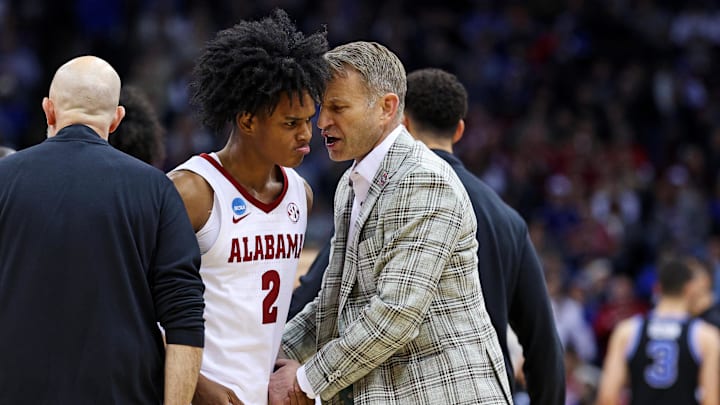 Mar 27, 2025; Newark, NJ, USA; Alabama Crimson Tide guard Aden Holloway (2) talks to head coach Nate Oats during the second half against the Brigham Young Cougars during an East Regional semifinal of the 2025 NCAA tournament at Prudential Center. Mandatory Credit: Vincent Carchietta-Imagn Images