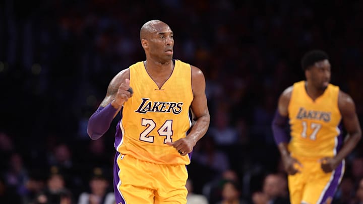 Apr 13, 2016; Los Angeles, CA, USA; Los Angeles Lakers forward Kobe Bryant (24) reacts against the Utah Jazz in the first quarter at Staples Center. Bryant concludes his 20-year NBA career tonight. Mandatory Credit: Robert Hanashiro-Imagn Images