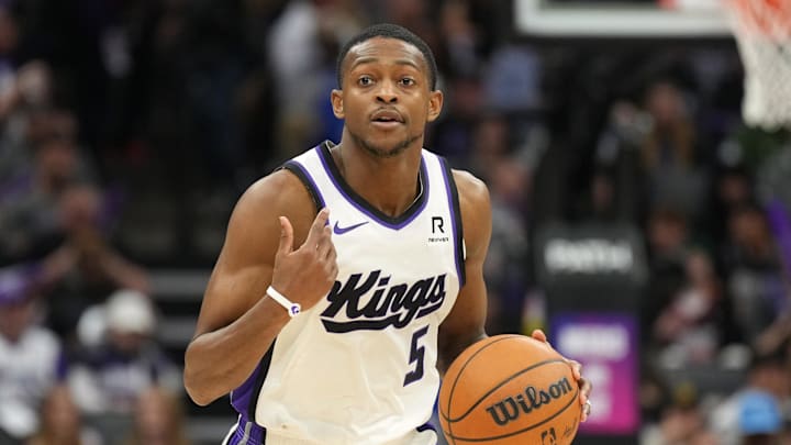 Dec 30, 2024; Sacramento, California, USA; Sacramento Kings guard De'Aaron Fox (5) dribbles against the Dallas Mavericks during the third quarter at Golden 1 Center. Mandatory Credit: Darren Yamashita-Imagn Images