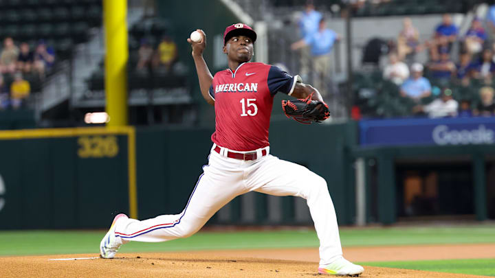 Jul 13, 2024; Arlington, TX, USA; American League Future pitcher Emiliano Teodo (15) throws during the first inning against the National League Future team during the Major league All-Star Futures game at Globe Life Field. Jul 13, 2024; Arlington, TX, USA; American League Future pitcher Emiliano Teodo (15) throws during the first inning against the National League Future team during the Major league All-Star Futures game at Globe Life Field.