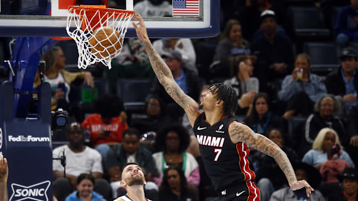 Oct 18, 2024; Memphis, Tennessee, USA; Miami Heat center Kel'el Ware (7) dunks during the second half against the Memphis Grizzlies at FedExForum. Mandatory Credit: Petre Thomas-Imagn Images