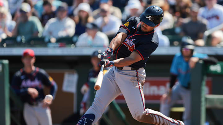 Jupiter, Florida, USA; Atlanta Braves designated hitter Drake Baldwin (75) hits an RBI single against the Miami Marlins during the third inning at Roger Dean Chevrolet Stadium. Jupiter, Florida, USA; Atlanta Braves designated hitter Drake Baldwin (75) hits an RBI single against the Miami Marlins during the third inning at Roger Dean Chevrolet Stadium.
