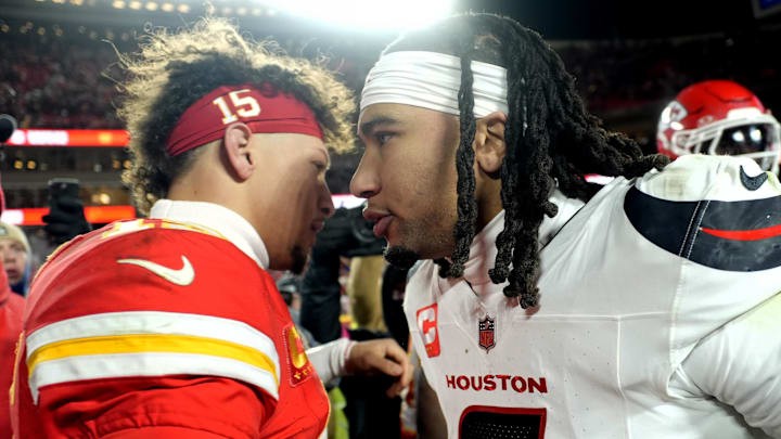 Jan 18, 2025; Kansas City, Missouri, USA; Kansas City Chiefs quarterback Patrick Mahomes (15) meets with Houston Texans quarterback C.J. Stroud (7) after a 2025 AFC divisional round game at GEHA Field at Arrowhead Stadium.