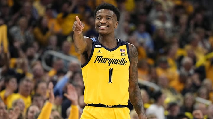 Feb 25, 2024; Milwaukee, Wisconsin, USA;  Marquette Golden Eagles guard Kam Jones (1) reacts after scoring a a basket during the second half against the Xavier Musketeers at Fiserv Forum. Mandatory Credit: Jeff Hanisch-Imagn Images