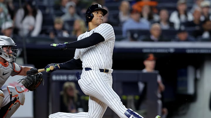 Sep 25, 2024; Bronx, New York, USA; New York Yankees right fielder Juan Soto (22) follows through on a two run home run against the Baltimore Orioles during the fifth inning at Yankee Stadium.