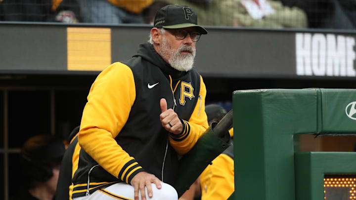 Apr 7, 2025; Pittsburgh, Pennsylvania, USA;  Pittsburgh Pirates manager Derek Shelton (17) looks on from the dugout against the St. Louis Cardinals during the first inning at PNC Park. Mandatory Credit: Charles LeClaire-Imagn Images