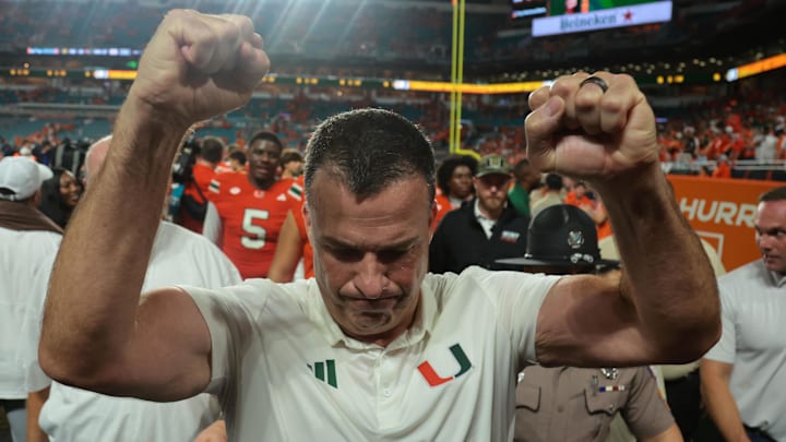 Aug 31, 2025; Miami Gardens, Florida, USA; Miami Hurricanes head coach Mario Cristobal reacts after defeating the Notre Dame Fighting Irish at Hard Rock Stadium. Mandatory Credit: Sam Navarro-Imagn Images